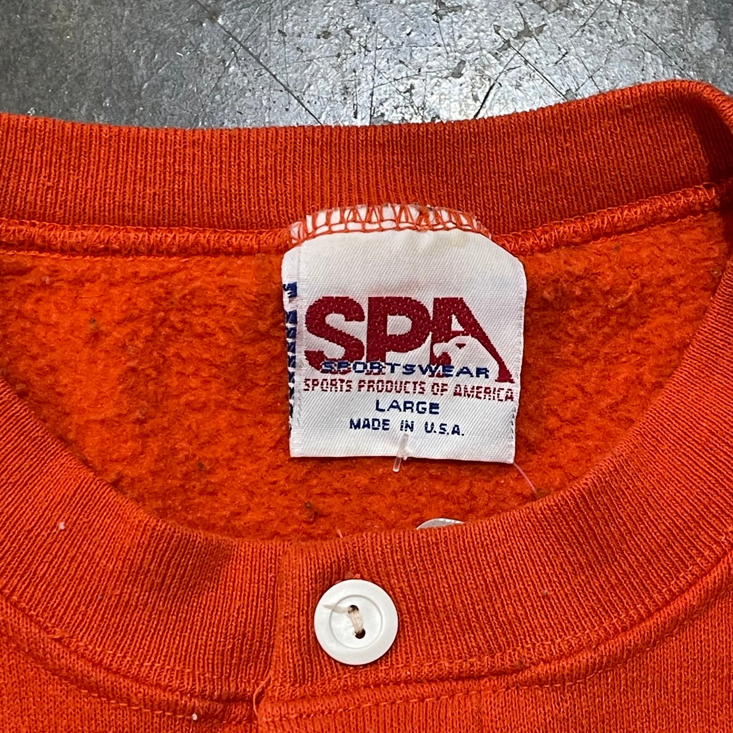 SPA Auburn Orange Small Logo Henley Crew