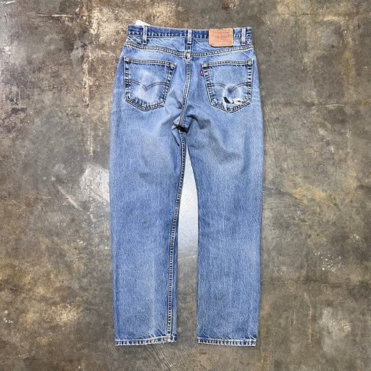 Levi's Faded and Distressed 505 Medium Wash Jeans