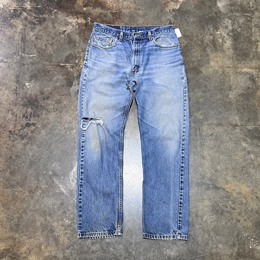 Levi's Faded and Distressed 505 Medium Wash Jeans